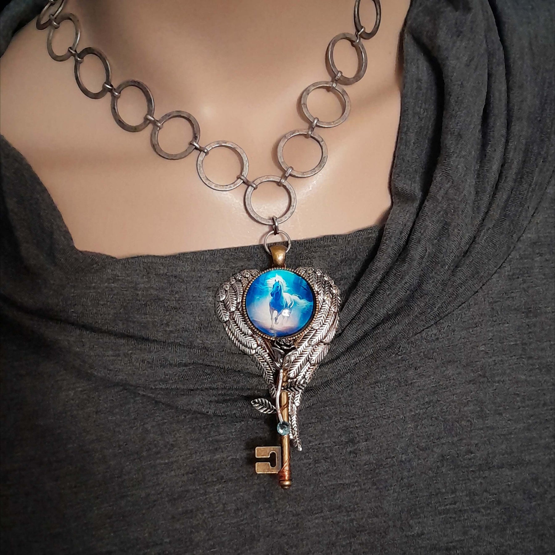 Blue Horse Cabachon Key Wing Necklace