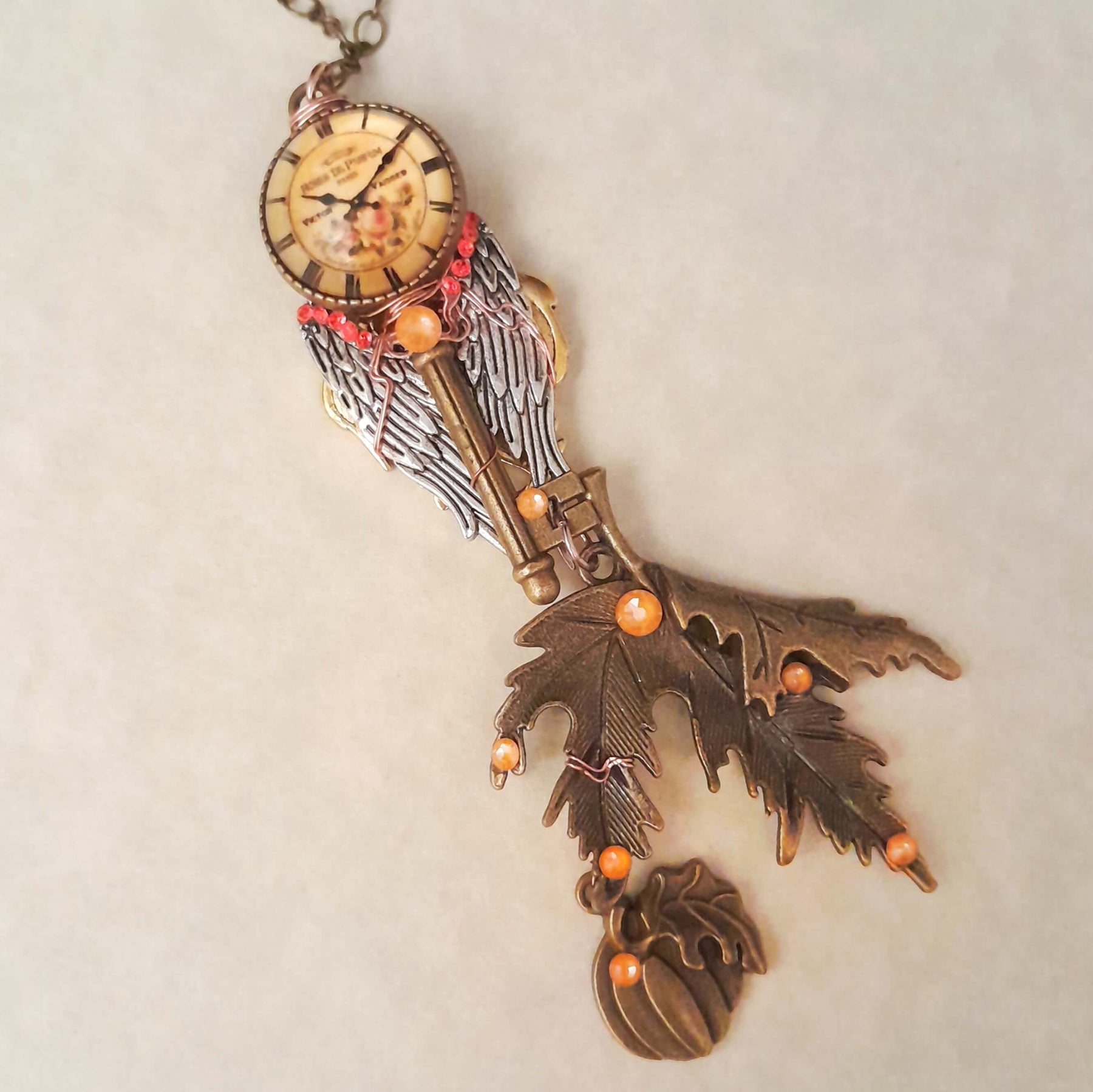 Maple Leaf Winged Clock Necklace